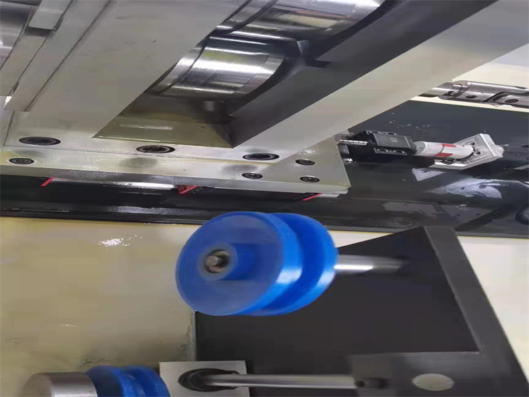 What Is The Purpose Of The Tension Control Dancer On The Wire Flattener Machine?